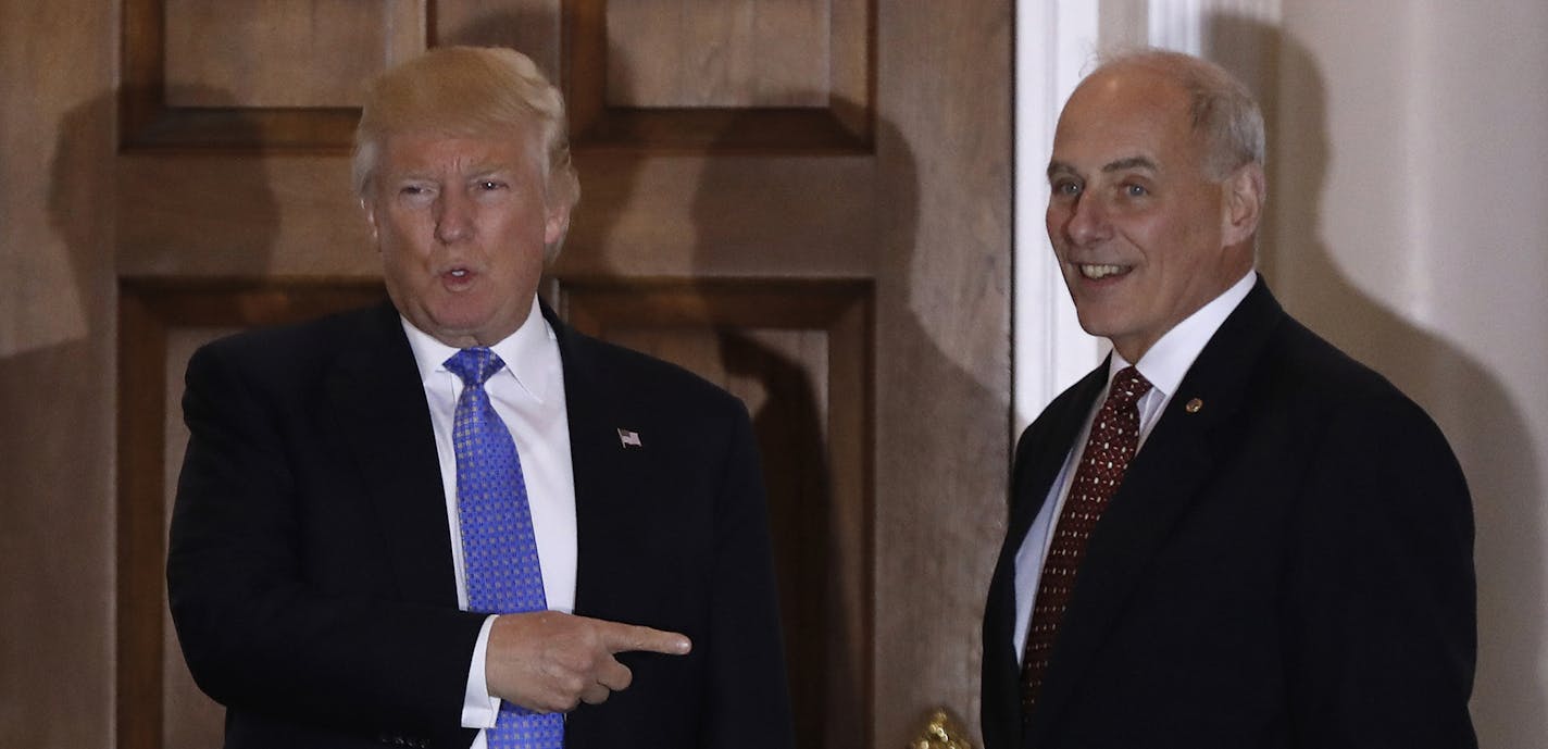 FILE - In this Nov. 20, 2016 file photo, President-elect Donald Trump talks to media as he stands with retired Marine Gen. John Kelly, at the Trump National Golf Club Bedminster clubhouse in Bedminster, N.J. Trump is tapping another four-star military officer for his administration. He has picked Kelly to lead the Homeland Security Department, according to people close to the transition. (AP Photo/Carolyn Kaster, File) ORG XMIT: MIN2016120715425773