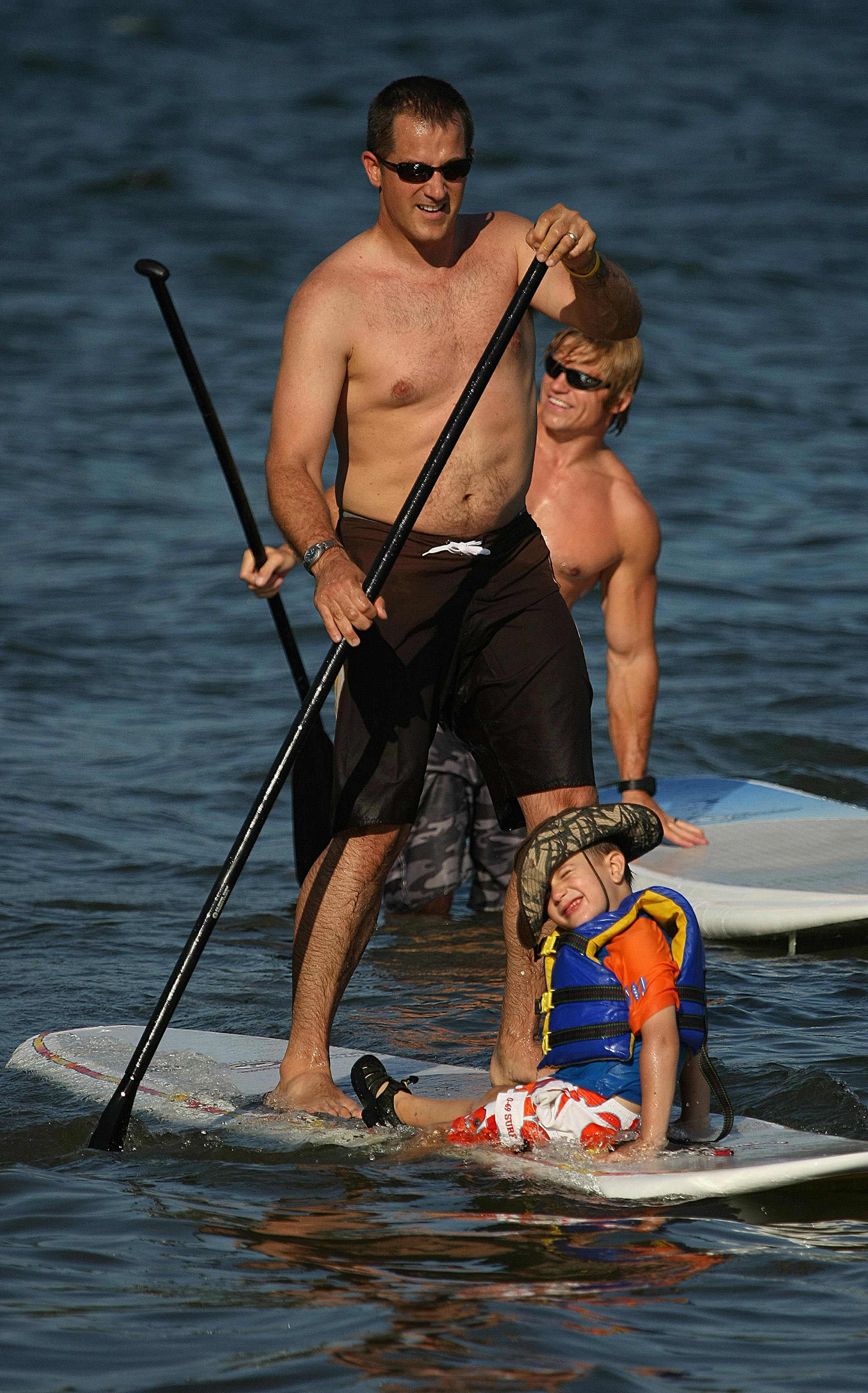 Dan Krolczyk, Tara's husband, gave their son, Leo, a ride on his board at Lake Calhoun's North Beach