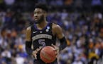Washington's Jaylen Nowell sets up a play in the first half during a second round men's college basketball game against North Carolina in the NCAA Tou