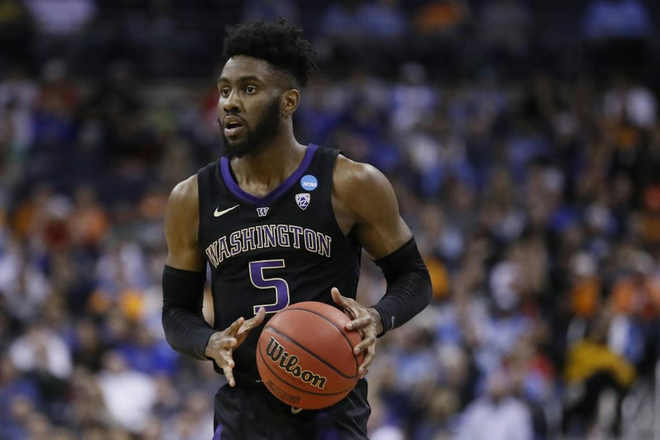 Washington's Jaylen Nowell sets up a play in the first half during a second round men's college basketball game against North Carolina in the NCAA Tournament, Sunday, March 24, 2019, in Columbus, Ohio.