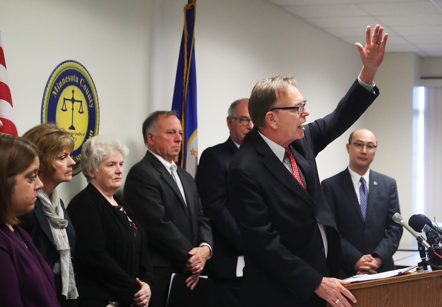 About a half dozen county attorneys from across the state formally announced the legal action at a news conference Thursday morning at the Minnesota County Attorney&#x2019;s Association offices in St. Paul. Thursday, Nov. 30, 2017, in St. Paul, MN. Here, Pete Orput, Washington County Attorney, gestured with his hand about the meteoric rise in the illegal use of opioids in his country during the press conference.] DAVID JOLES &#x2022; david.joles@startribune.com Ramsey County Attorney John Choi a