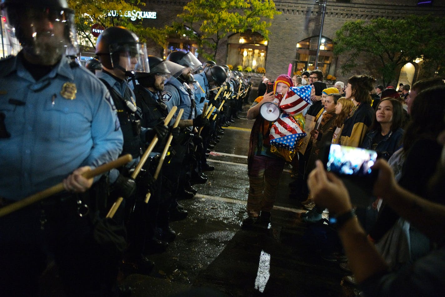 Protests were mostly peaceful outside of Target Center.] President Donald Trump addressed his supporters at a rally in Target Center in Minneapolis. RICHARD TSONG-TAATARII &#xa5; richard.tsong-taatarii@startribune.com