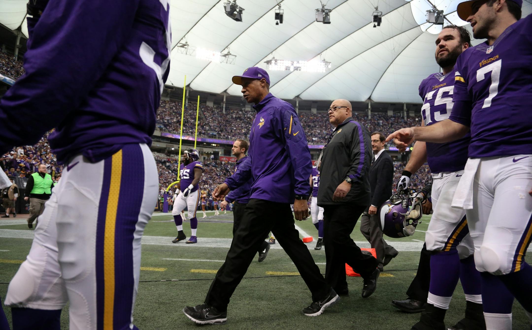 Vikings head coach Leslie Frazier walked off the field at halftime against the Detroit Lions during the final game at the Metrodome.