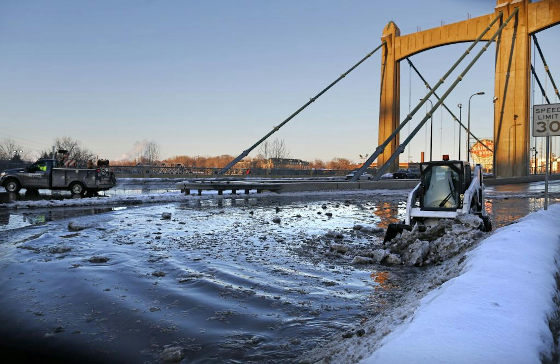 Water main break floods the area around Hennepin Ave and 2nd St. Thursday afternoon. This is the intersection of Hennepin Ave and First St. South.