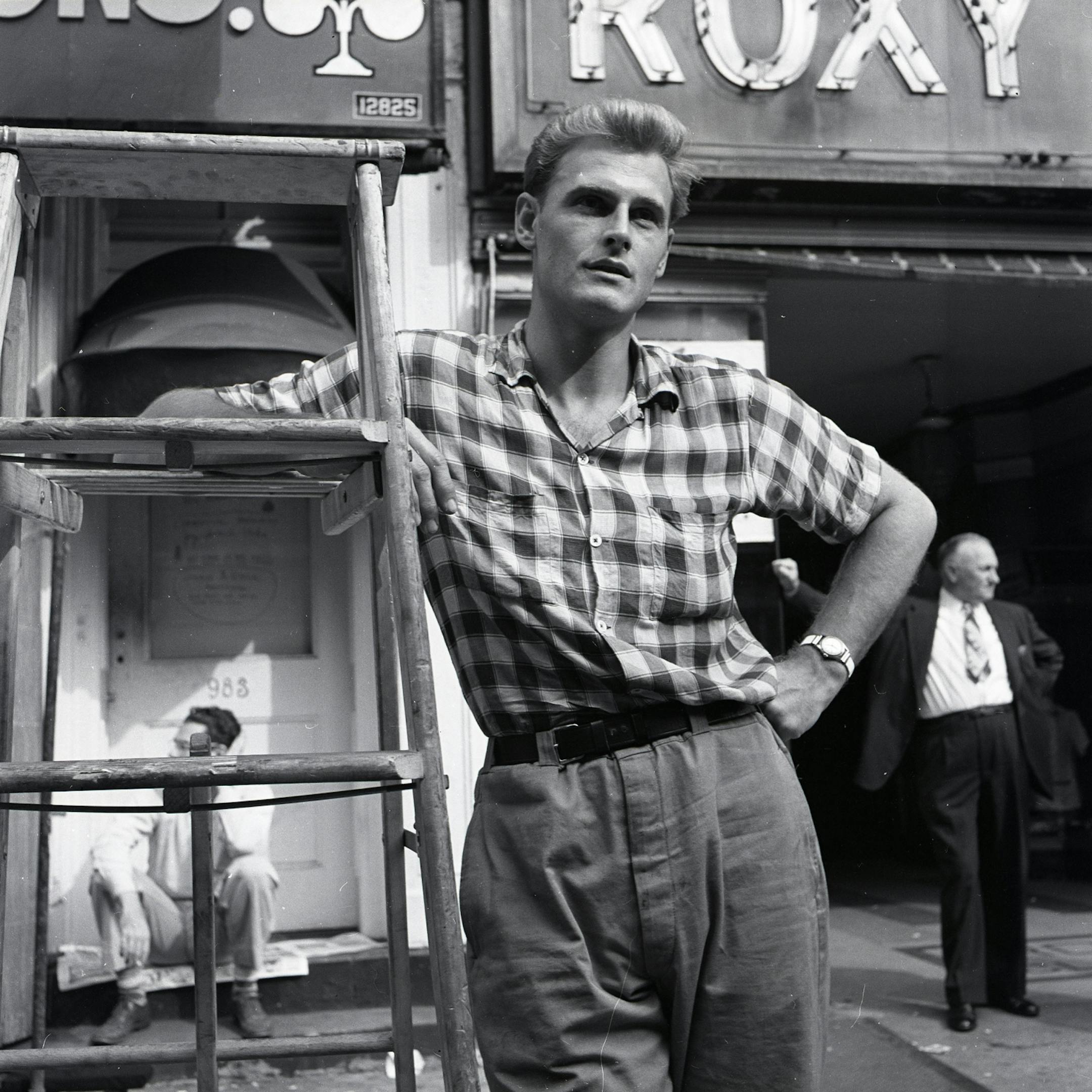 Vivian Maier photo, "Man Leaning on Ladder."