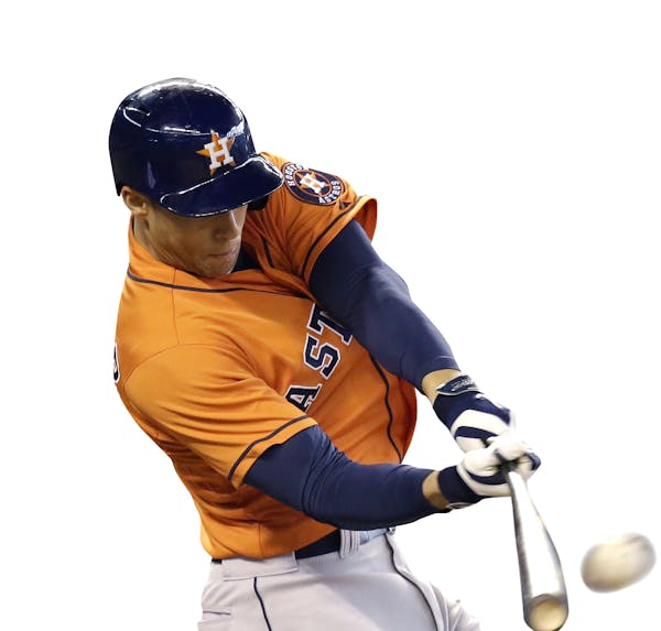 Houston Astros' George Springer hits a two-run home run against the Seattle Mariners in the sixth inning of a baseball game Sunday, May 25, 2014, in S