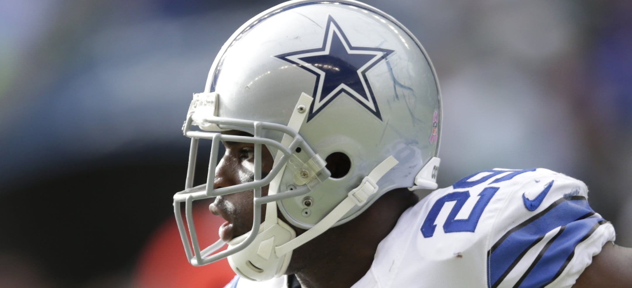 Dallas Cowboys running back DeMarco Murray runs in the first half of an NFL football game against the Seattle Seahawks, Sunday, Oct. 12, 2014, in Seattle. (AP Photo/Scott Eklund)