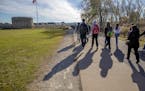 High school students made their way across a sidewalk that sits above a tunnel on Hwy. 5 on a visit to Fort Snelling on October 24. A proposed $2 bill
