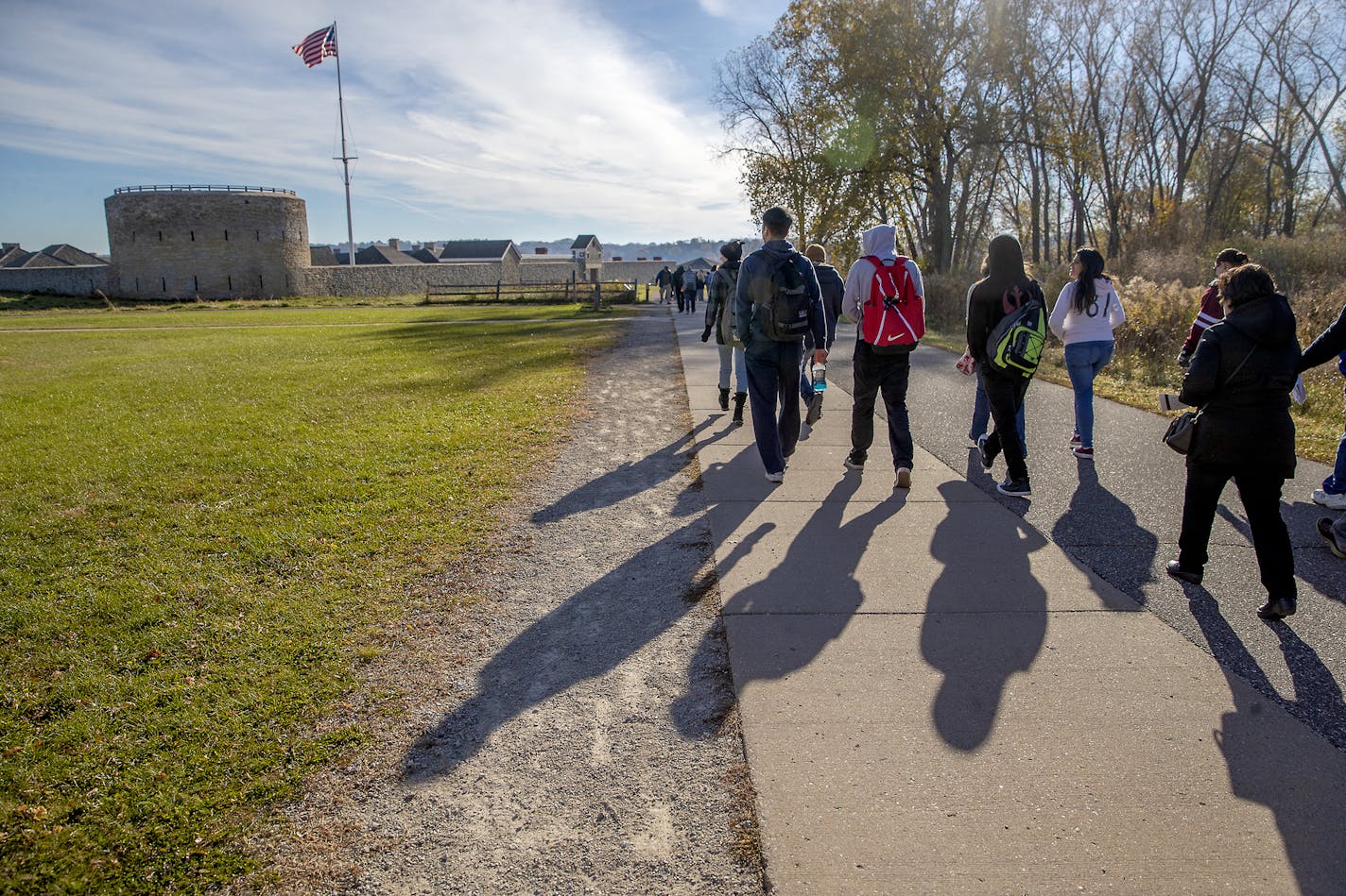 High school students made their way across a sidewalk that sits above a tunnel on Hwy. 5 on a visit to Fort Snelling on October 24. A proposed $2 billion Riverview Corridor streetcar project is planned in that area.