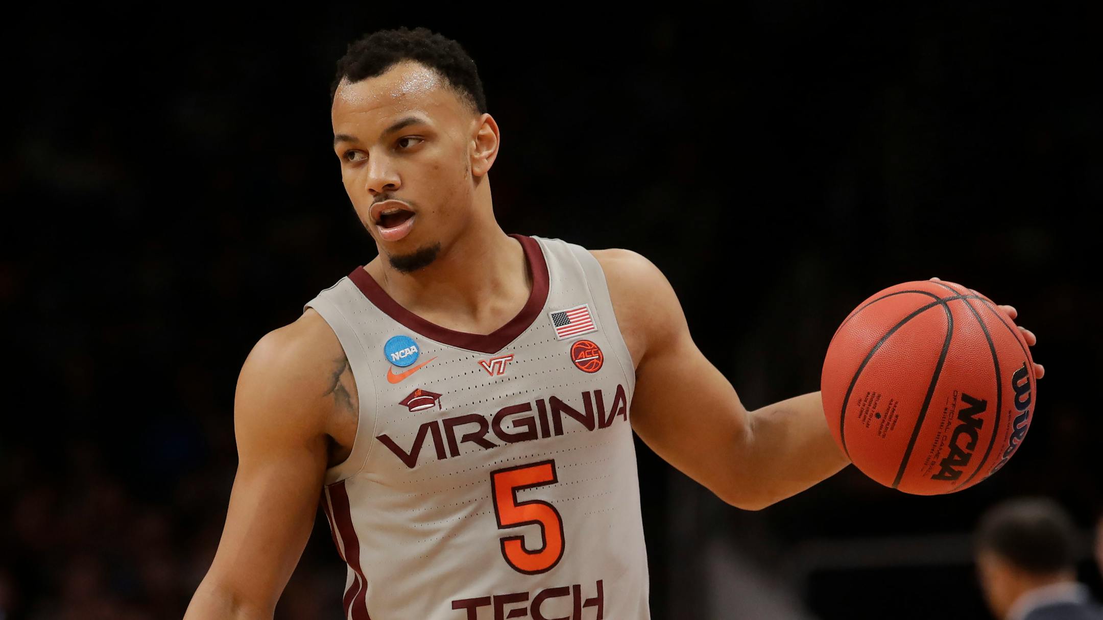 Virginia Tech guard Justin Robinson plays against Liberty during a second-round game in the NCAA men's college basketball tournament Sunday, March 24, 2019, in San Jose, Calif. (AP Photo/Jeff Chiu)