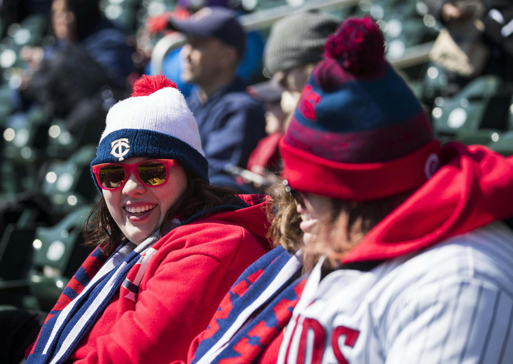 Amber Skinner of Aberdeen, South Dakota sits in the stands with friends before the game. ] LEILA NAVIDI ï leila.navidi@startribune.com BACKGROUND INFORMATION: The Minnesota Twins home opener against the Seattle Mariners at Target Field in Minneapolis on Thursday, April 5, 2018.