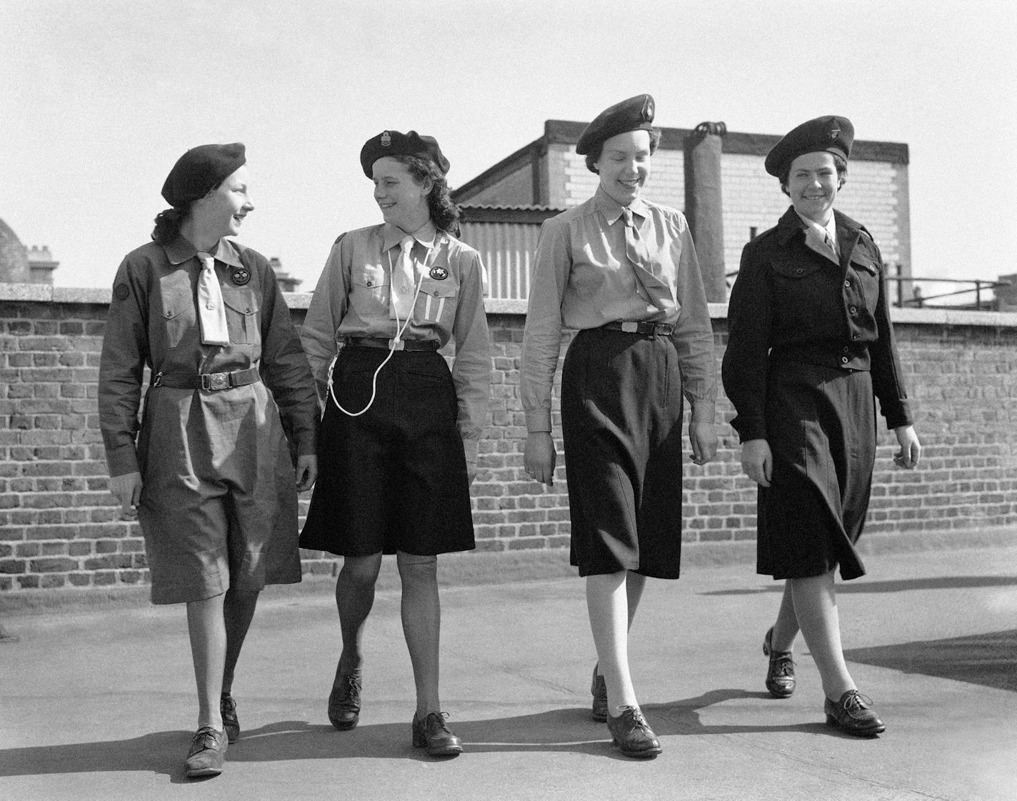 Girl Guides modeled their new uniforms in 1947 England. Associated Press