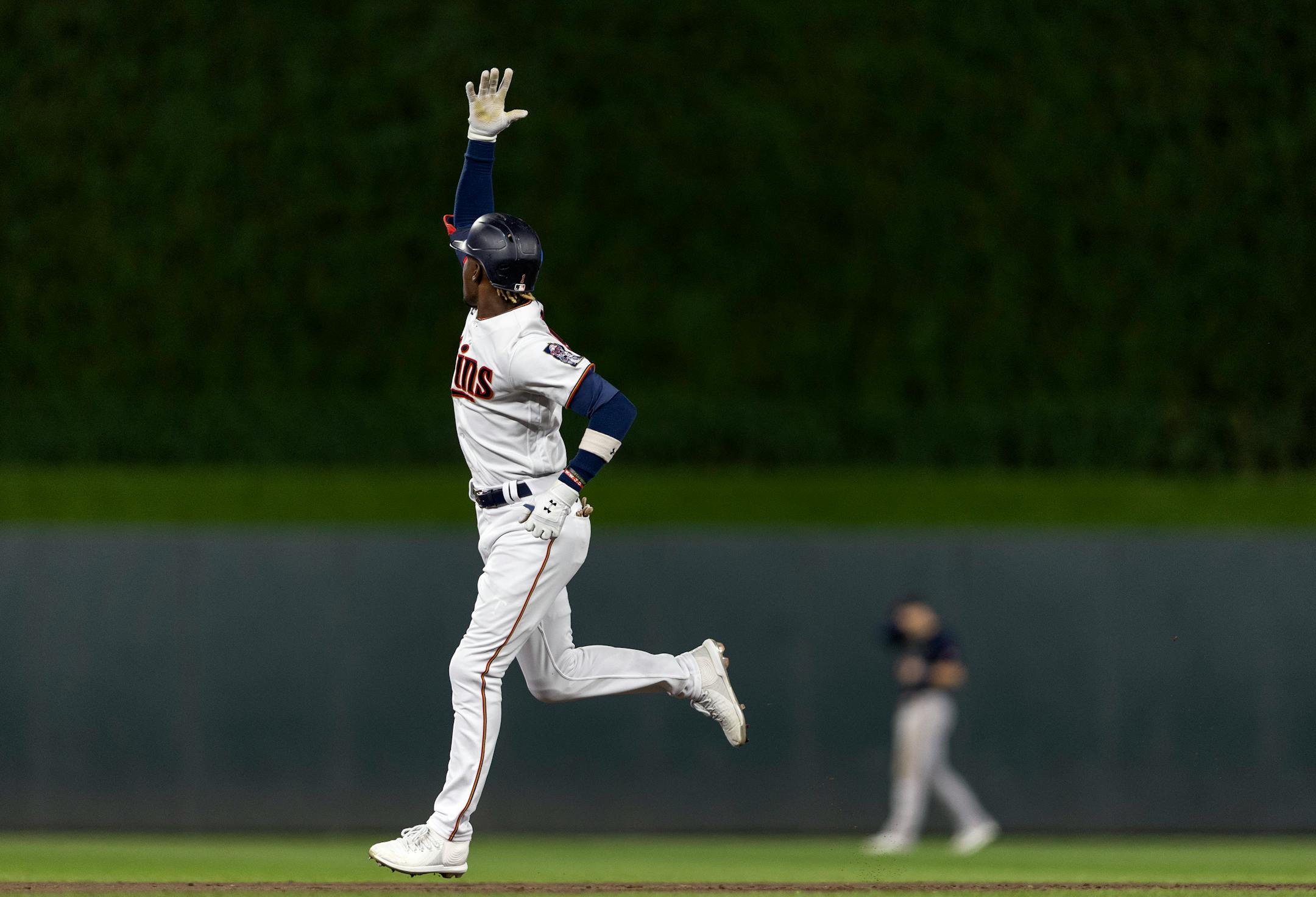 Nick Gordon of the Minnesota Twins celebrates after hitting a grand slam home run in the fifth inning.
