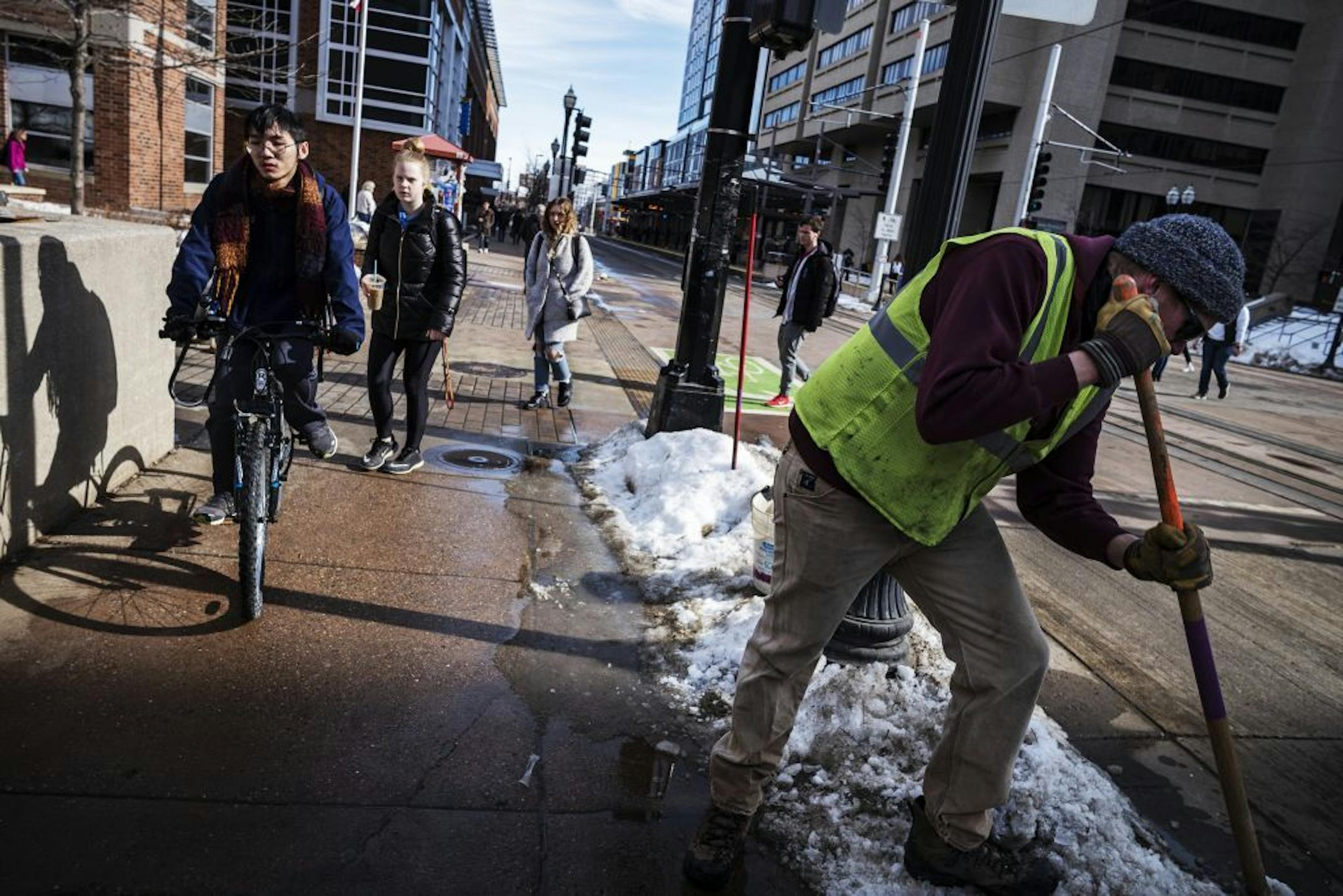 University of Minnesota students took advantage of the warmer temperatures as they walked to and from classes on Feb. 24. Just days later, the temperatures hit 50 degrees.