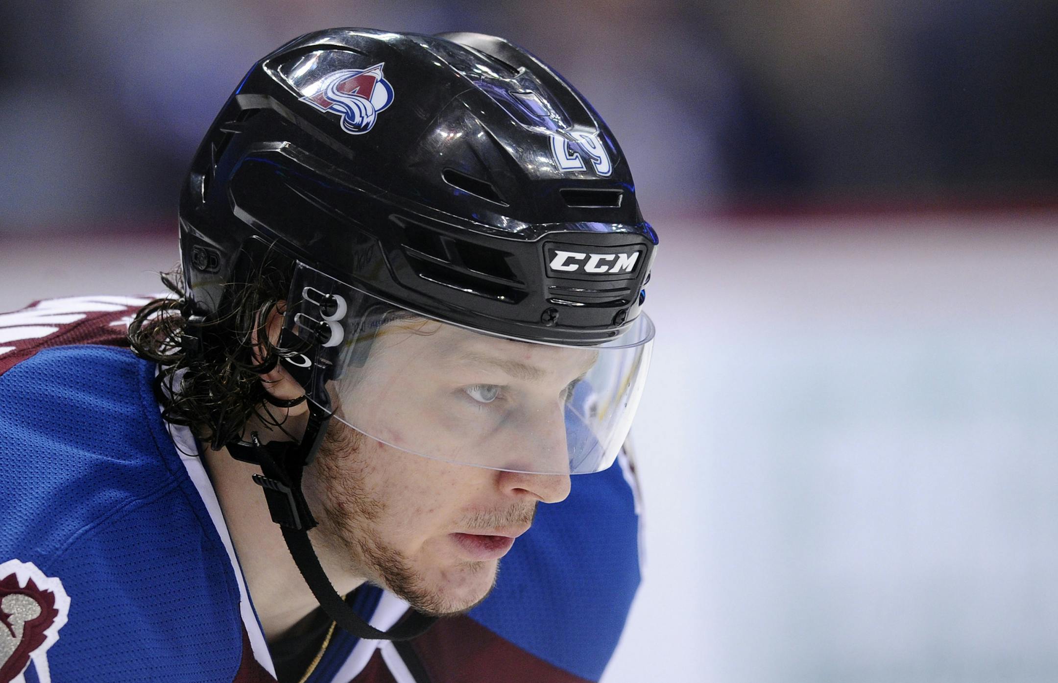 Colorado Avalanche center Nathan MacKinnon looks on against the Minnesota Wild in the third period of Game 2 of an NHL hockey first-round playoff series on Saturday, April 19, 2014, in Denver. The Avalanche beat the Wild 4-2. (AP Photo/Jack Dempsey) ORG XMIT: OTK