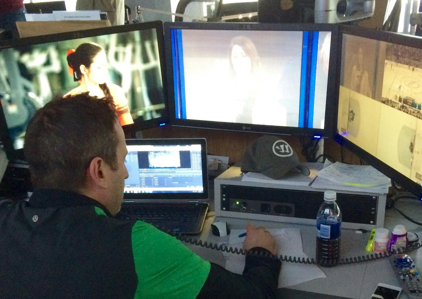 Coordinator Tim Campbell watches the Bruins-Lightning game in the NHL Situation Room in Toronto.