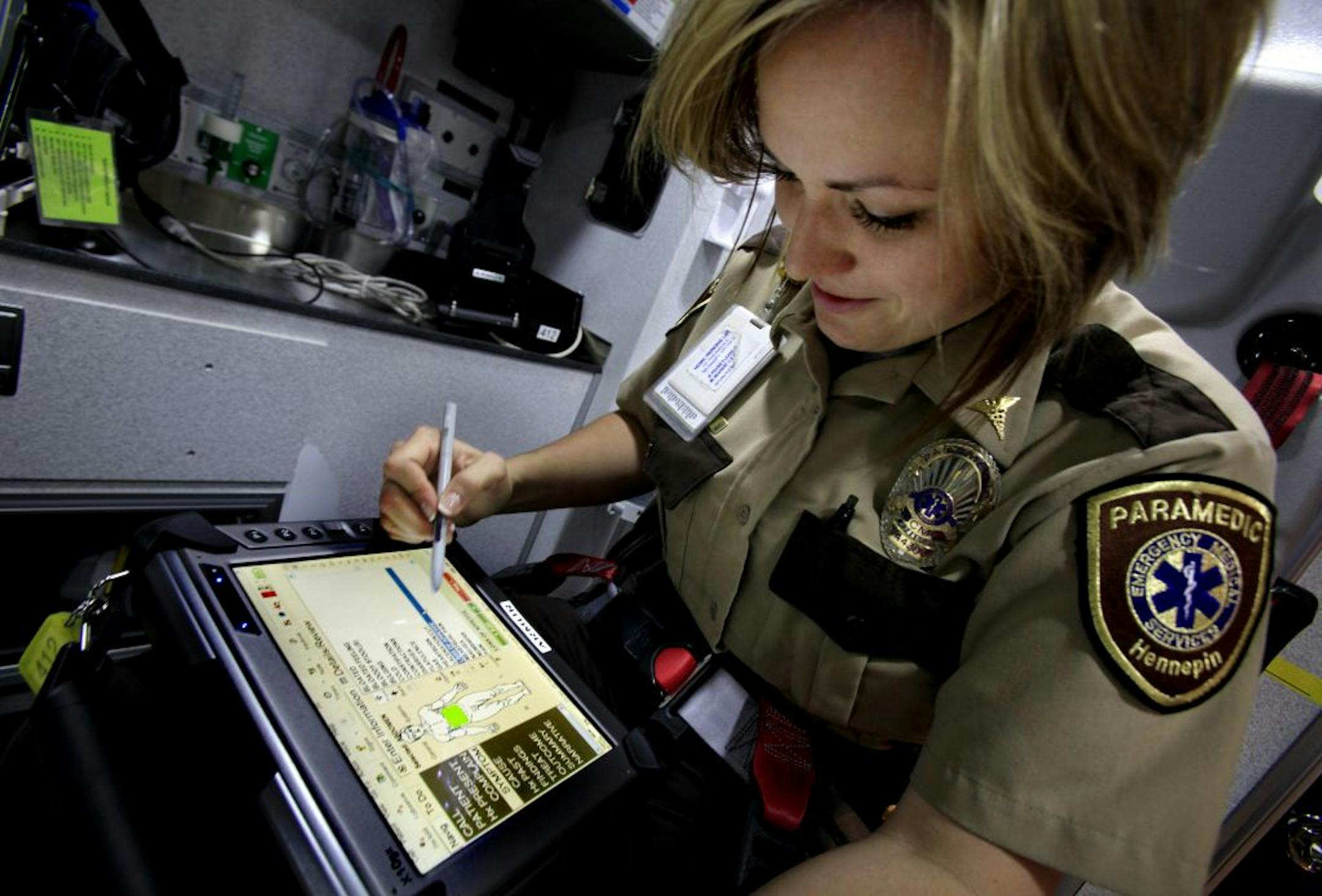 Mari Hill, a paramedic for Hennepin County Medical Center, demonstrated the SafetyPad at HCMC in Minneapolis, MN on May 17, 2012.