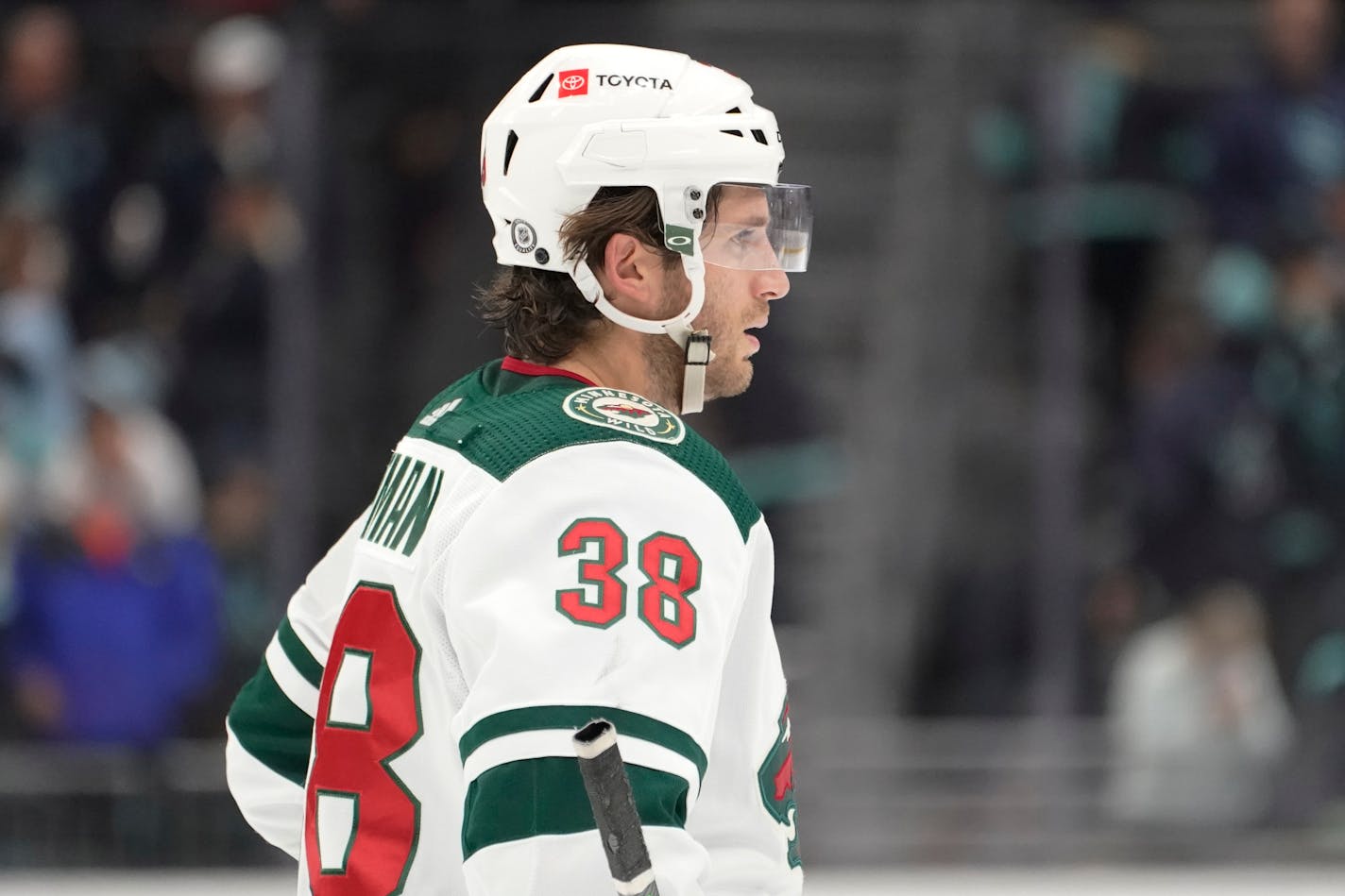 Minnesota Wild right wing Ryan Hartman stands on the ice after the team's NHL hockey game against the Seattle Kraken, Thursday, Oct. 28, 2021, in Seattle. The Kraken won 4-1. (AP Photo/Ted S. Warren)