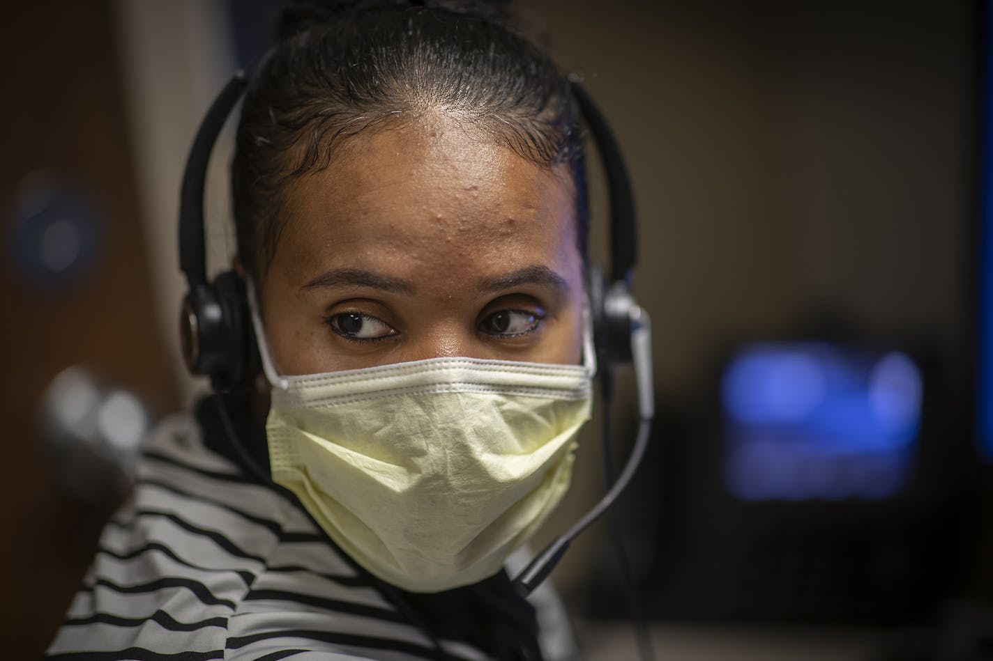 Interpreter Lansa Dawano worked at the M Health Fairview call center to interpret the Oromo and Amharic languages for callers, Wednesday, May 20, 2020 in Minneapolis.