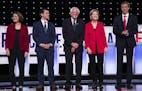 From left: Sen. Amy Klobuchar (D-Minn.), Pete Buttigieg, Sen. Bernie Sanders (I-Vt.), Sen. Elizabeth Warren (D-Mass.) and Beto O'Rourke stand on stage