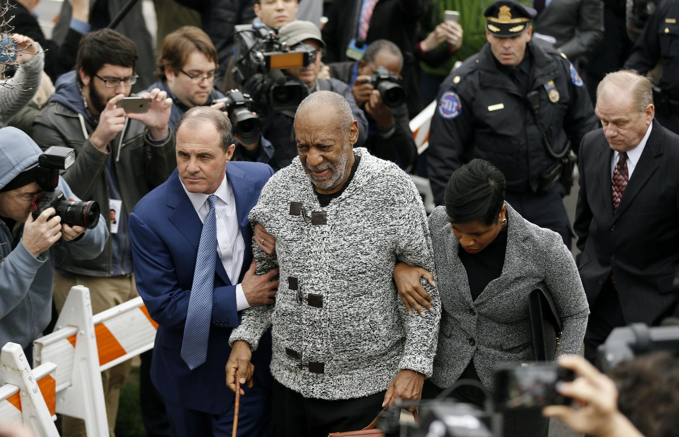 Bill Cosby arrives at court to face a felony charge of aggravated indecent assault on Wednesday in Elkins Park, Pa.