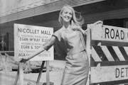 May 27, 1967 New Miss downtown Minneapolis Sandra Lee Larson on Nicollet Mall. The Young men who have passed up a dance with sandra Lee Larson because