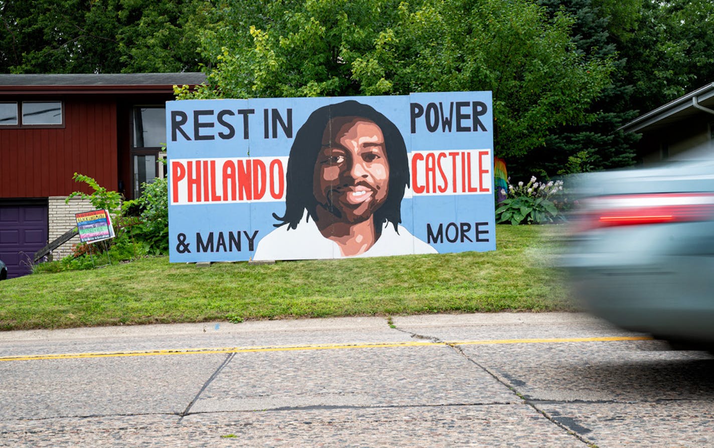 Semhar Solomon, senior at St. Anthony Village High School, is keeping pressure on city leaders after the council recently denied a proposed Philando Castile mural like this at the community center. Semhar painted this mural on plywood with friends and it is currently displayed in a former teacher's yard across the street from the Community Center, City Hall and the St Anthony Police Department. ] GLEN STUBBE • glen.stubbe@startribune.com Wednesday, July 22, 2020