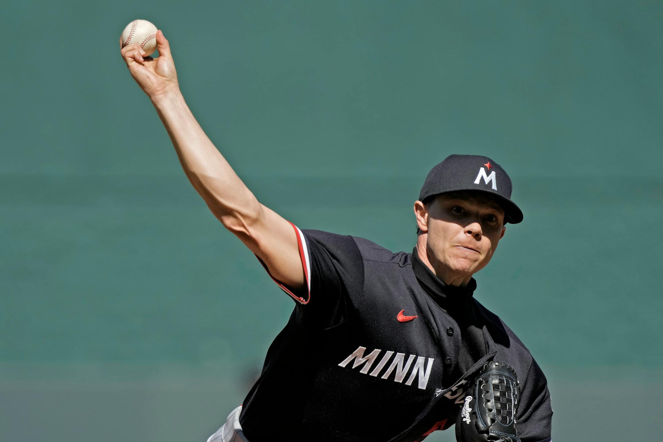 Minnesota Twins starting pitcher Sonny Gray throws during the first inning of a baseball game against the Kansas City Royals Saturday, April 1, 2023, in Kansas City, Mo. (AP Photo/Charlie Riedel)