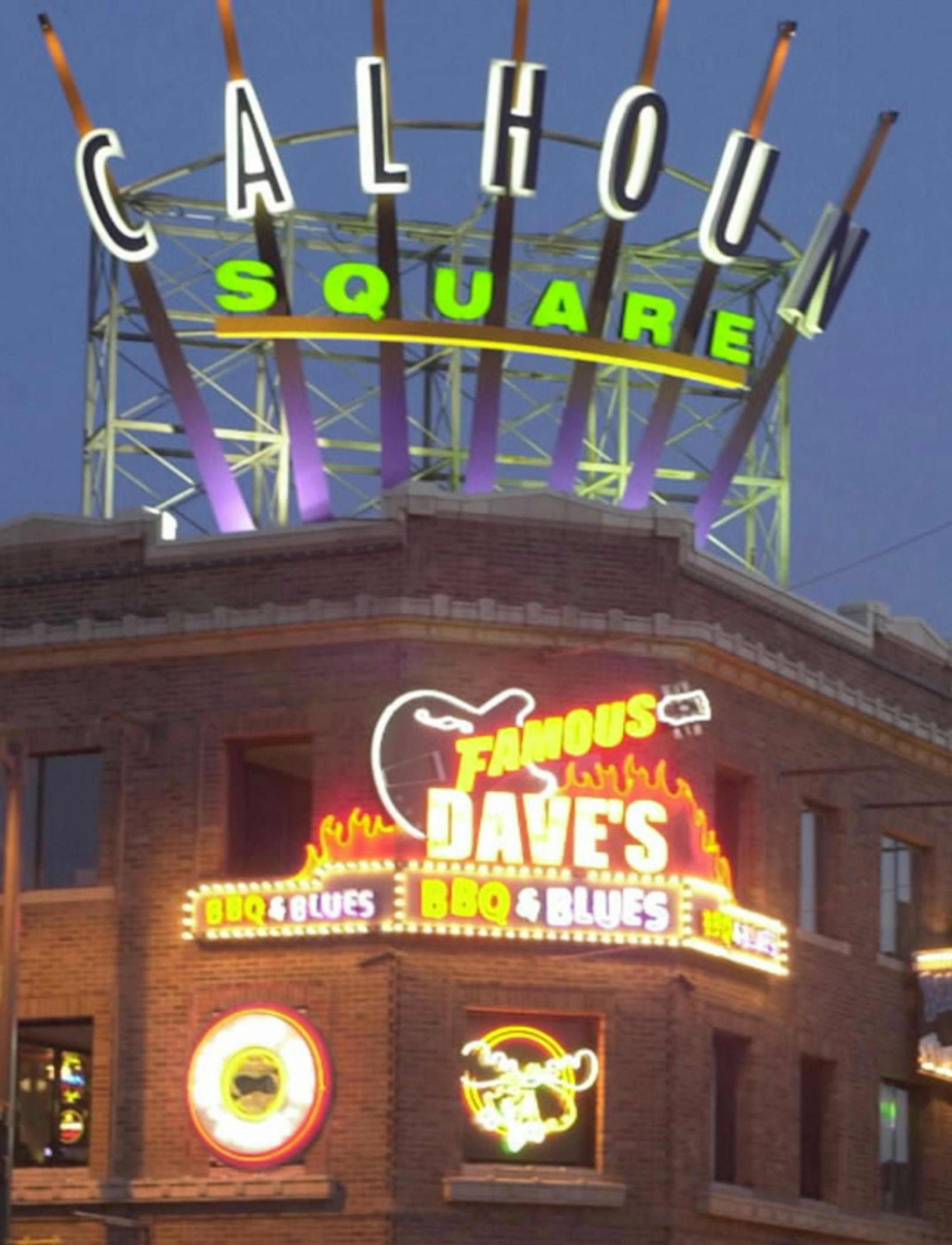 Calhoun Square
IN THIS PHOTO: The lights that come on at night at Calhoun Square make it a focus for Uptown. RICHARD TSONG -TAATARII