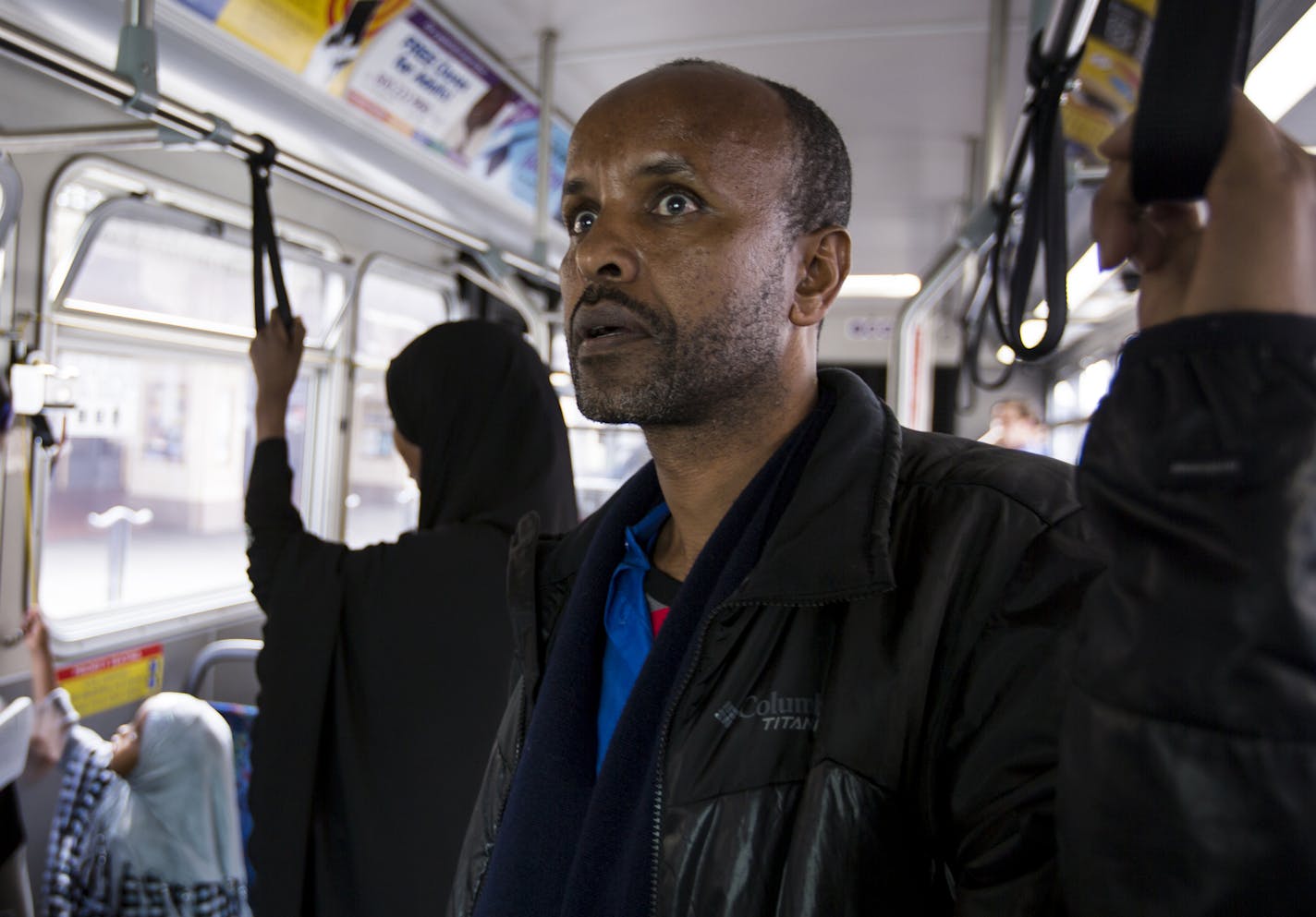 Abdirahman Abdullahi experiences many firsts, including learning how to navigate Twin Cities public transportation, as he and his family resettled in Minnesota from an Ethiopian refugee camp.