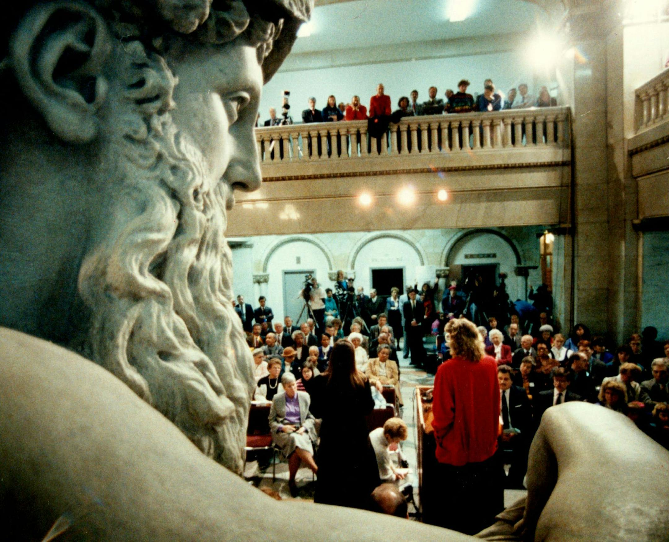 The Father of Waters statue stands sentry during the inauguration ceremony of Minneapolis city officials in 1990.