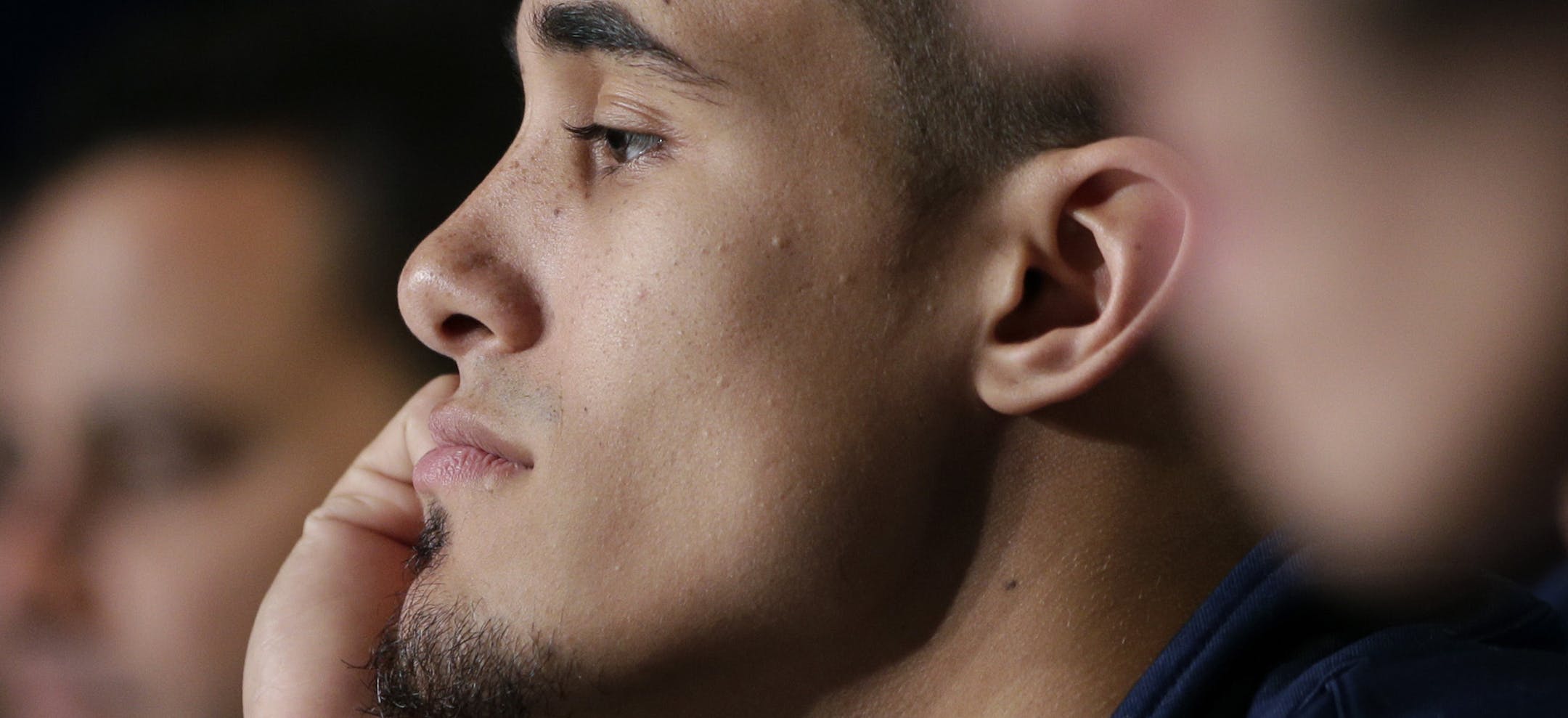 Arizona's Nick Johnson, center, listens to a question during a news conference at the NCAA college basketball tournament on Friday, March 28, 2014, in Anaheim, Calif. Arizona plays Wisconsin in a regional final on Saturday. (AP Photo/Jae C. Hong)