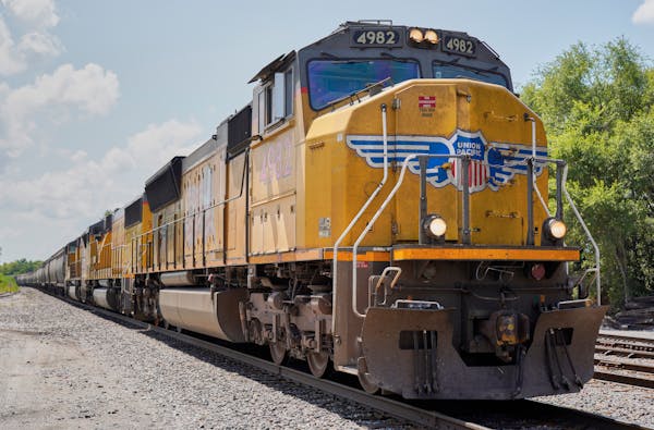 The trade and transportation sectors, which include railroads, saw job gains in March in Minnesota. Shown is a Union Pacific train.