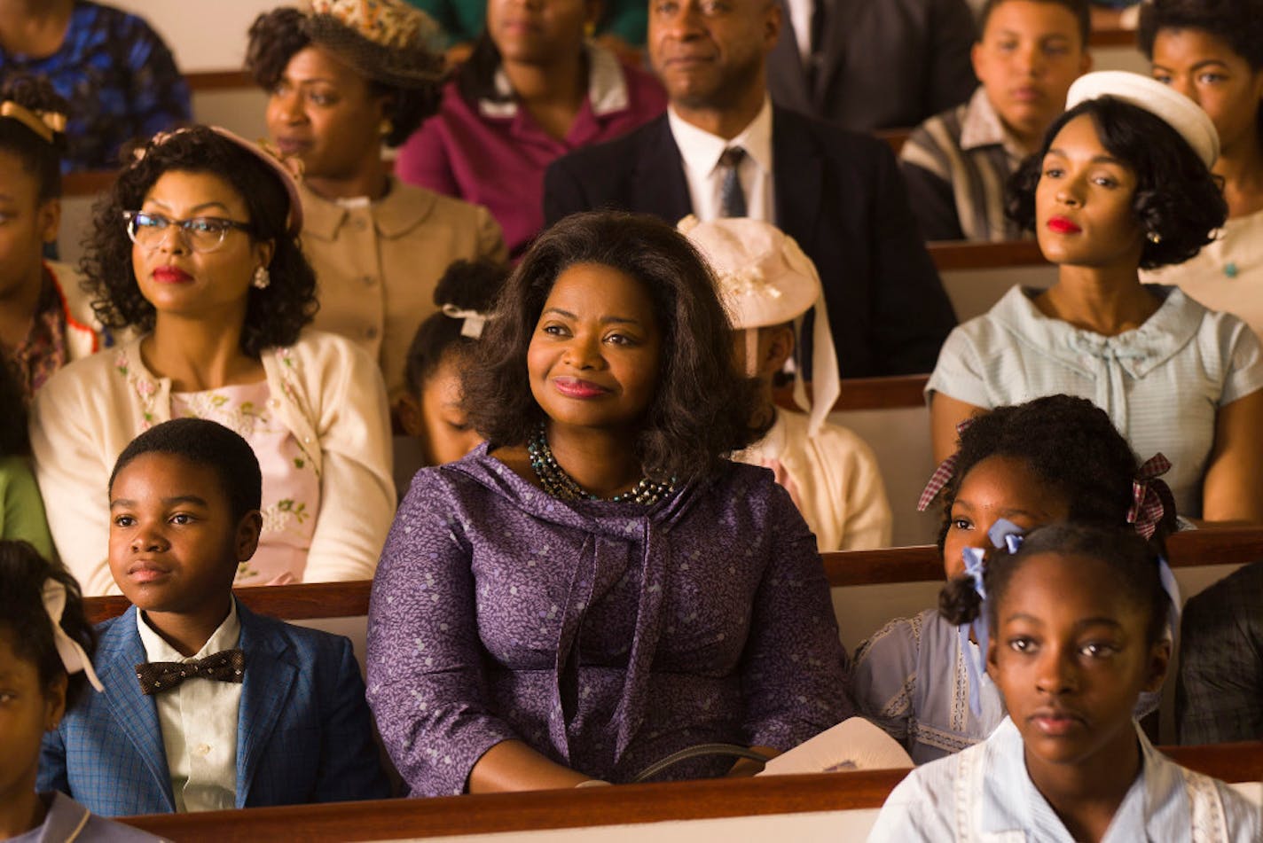 The new film "Hidden Figures" stars Taraji P. Henson, background left, Octavia Spencer, center, and Janelle Monae, background right.