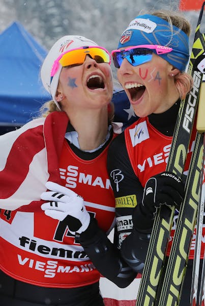 The winner Jessica Diggins, right, and teammate Kikkan Randall of the United States celebrate after finishing the Ladies 6x1.2 km Free Team Sprint at 