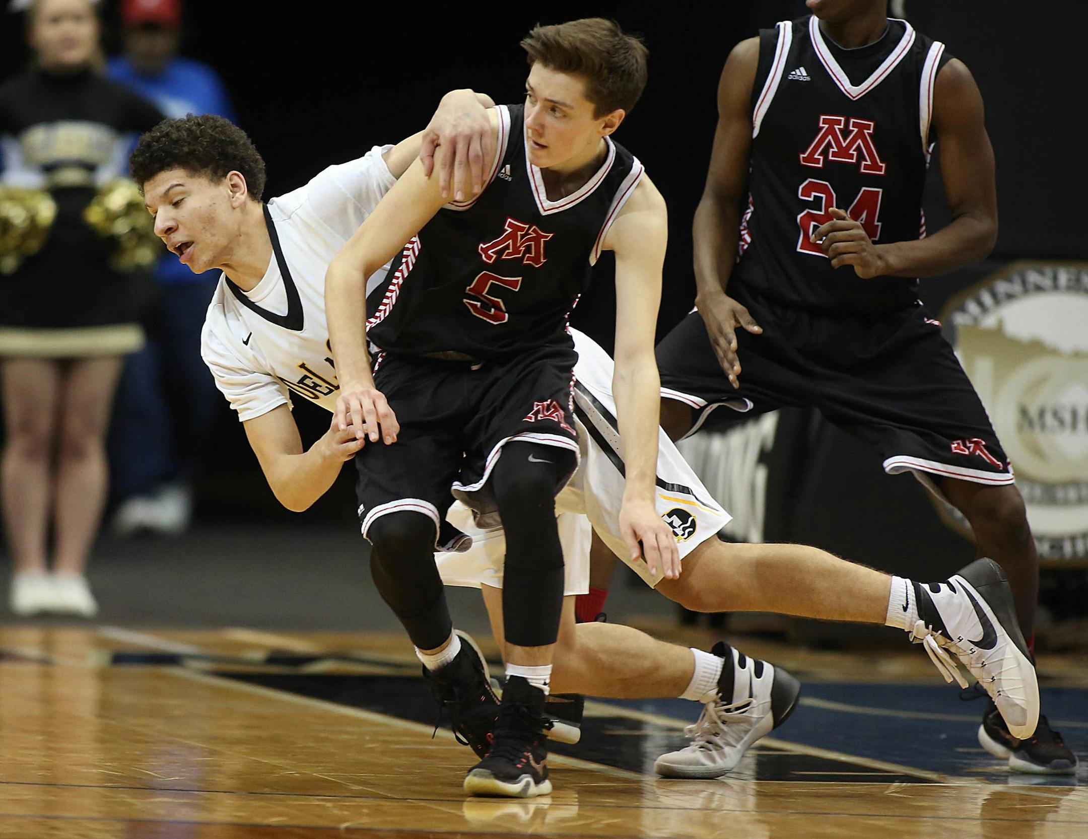 Monticello�s Matt todd (right) ran into DeLaSalle�s Dominic Bledsoe. ] JIM GEHRZ � james.gehrz@startribune.com / Minneapolis, MN / March 10, 2016 /12:00 and 2:00 PM � BACKGROUND INFORMATION: Action and reaction from the semifinals of the Class 3A Boys� 2016 State High School Basketball Tournament at Target Center.Noon: DeLaSalle vs Monticello. DeLaSalle won the game, 59-45.2 PM: Red Wing vs Fergus Falls