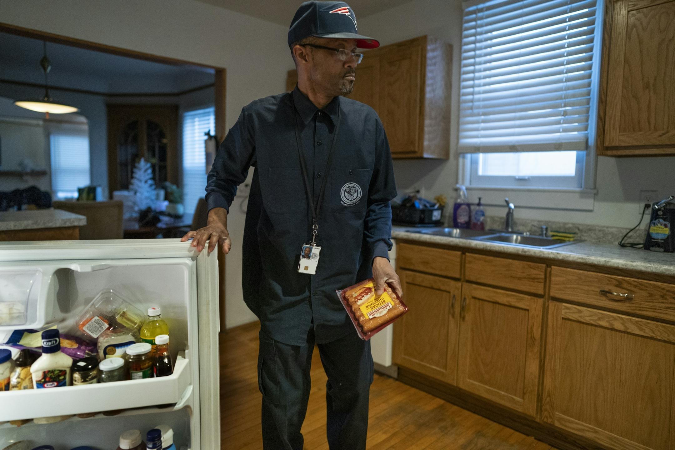 After coming home from work, Donald Belle, 56, cooked a couple of hot dogs at his transitional shelter operated by the Minnesota Assistance Council on Veterans (MACV).
