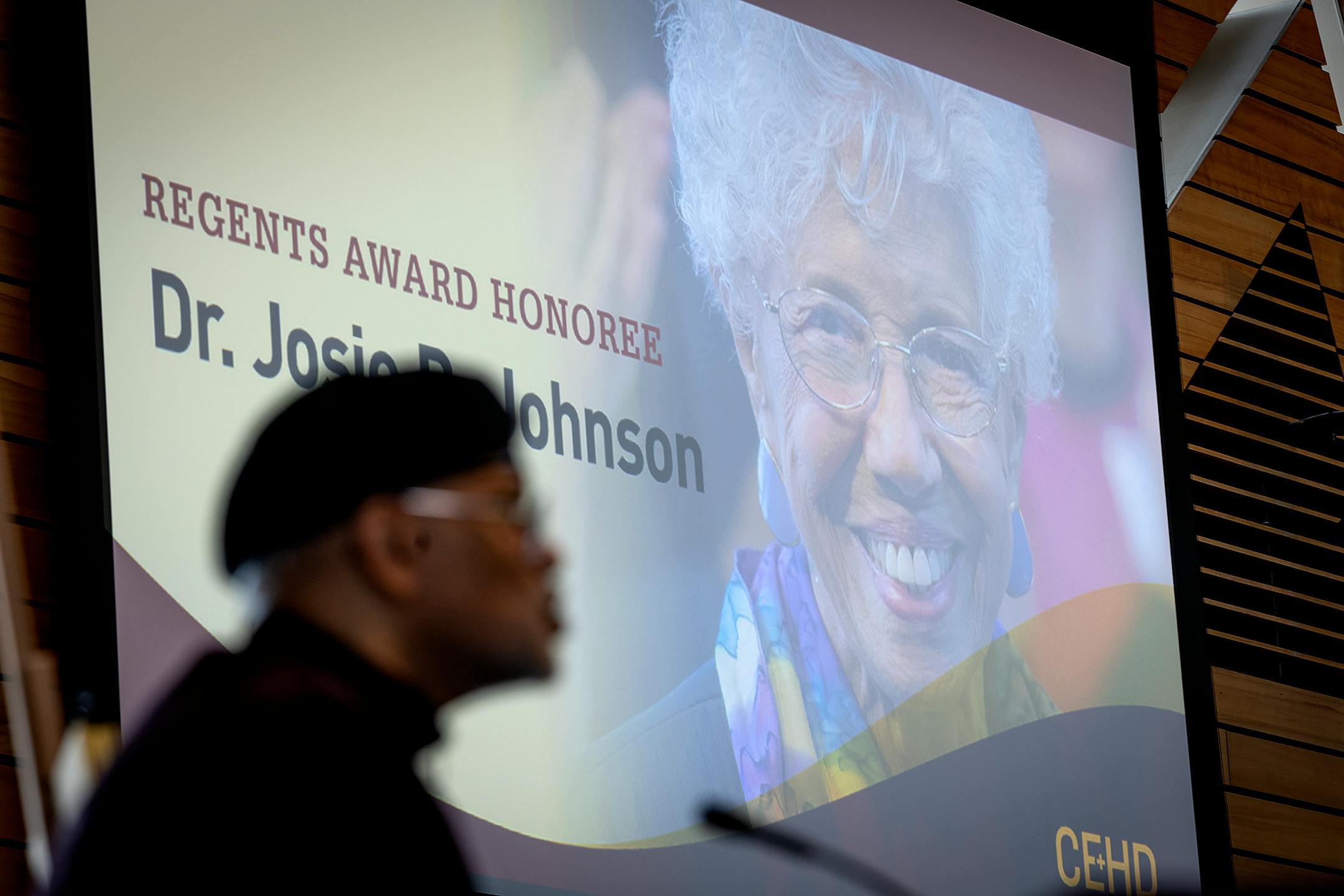 Josie R. Johnson is honored by Dr. John S. Wright during a ceremony.