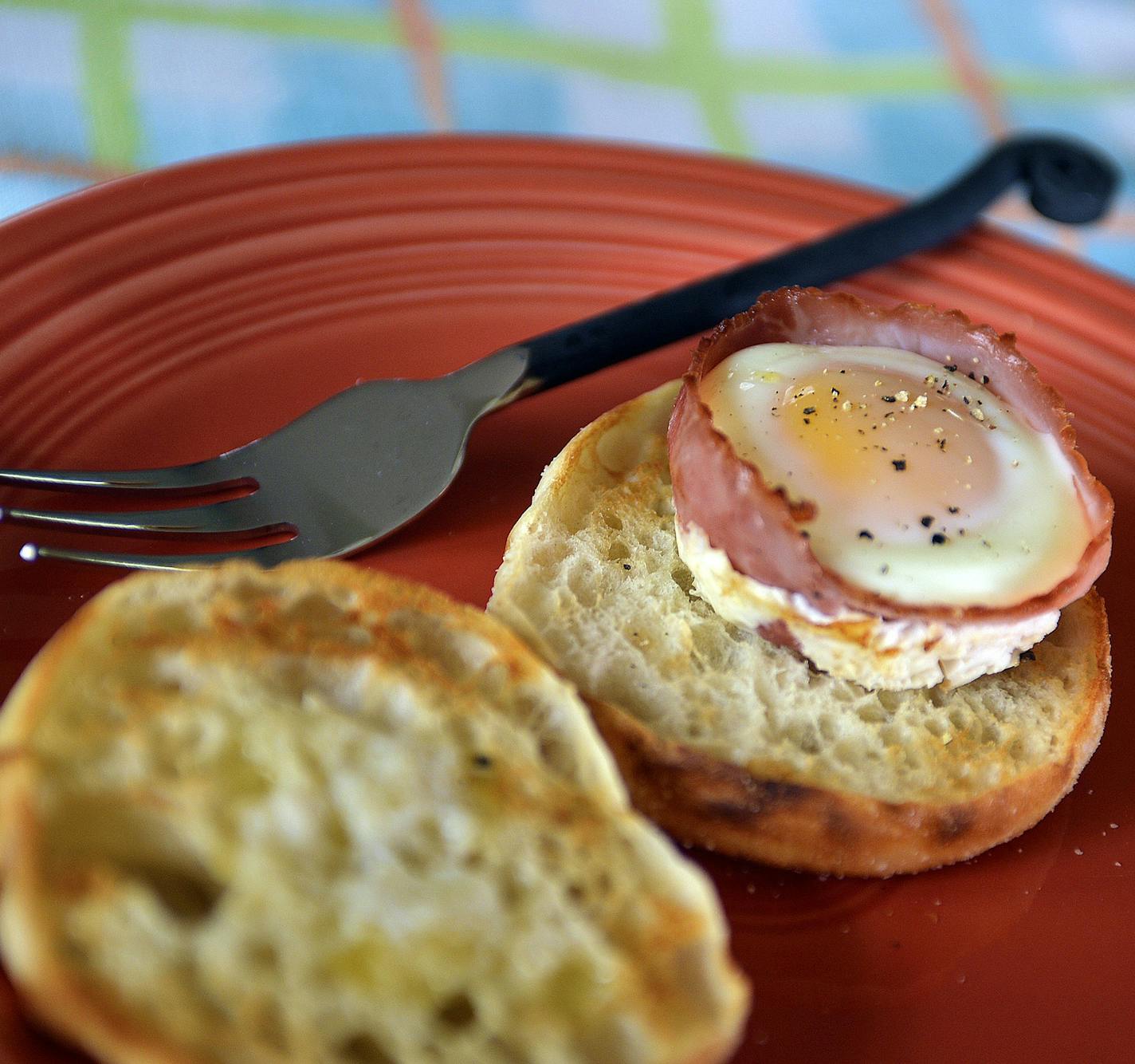 Ham and egg cup on English muffin. (T. Ortega Gaines/Charlotte Observer/TNS) ORG XMIT: 1182925