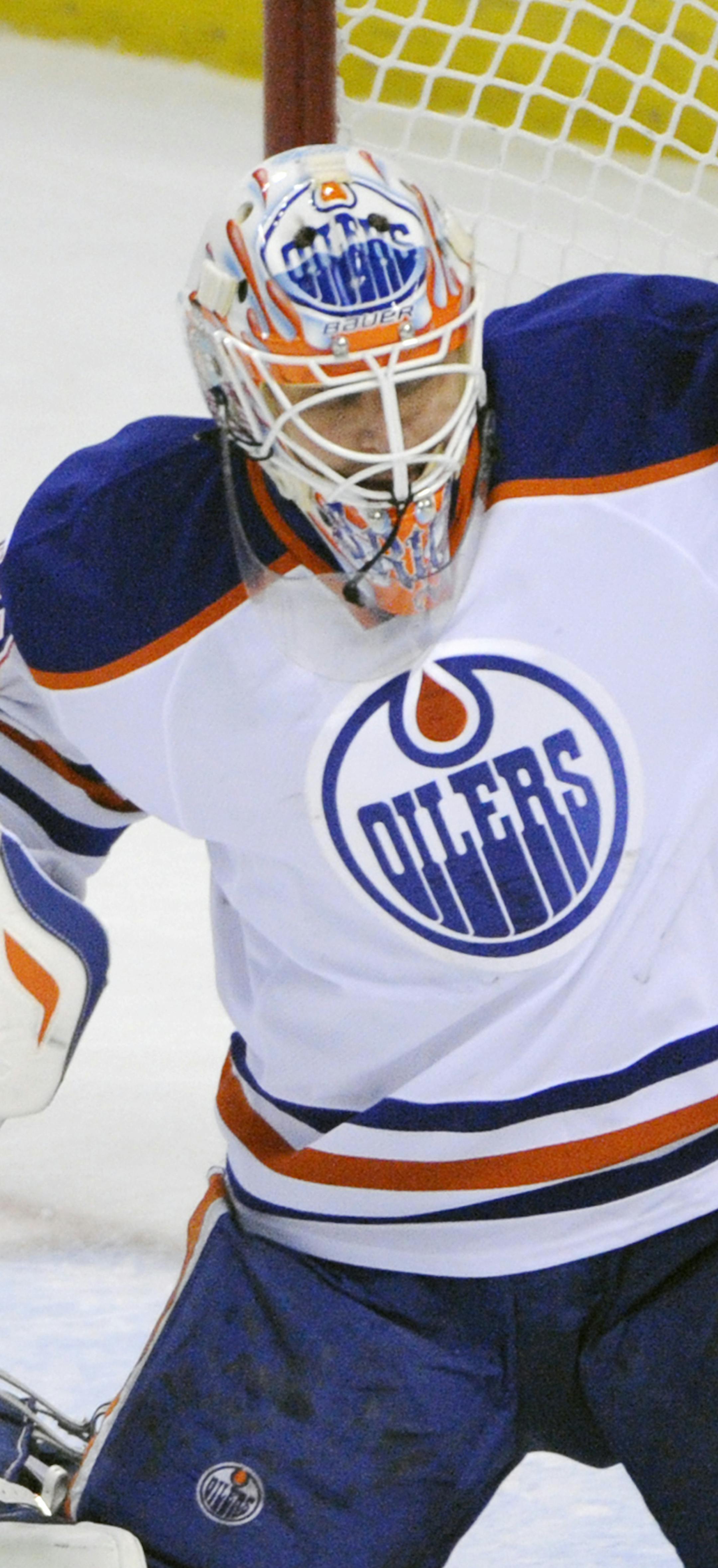 Edmonton Oilers goaltender Ilya Bryzgalov (80), of Russia, gets beat for a goal by Buffalo Sabres' Drew Stafford during the first period of an NHL hockey game in Buffalo, N.Y., Monday, Feb 3, 2014. Edmonton won 3-2. (AP Photo/Gary Wiepert)