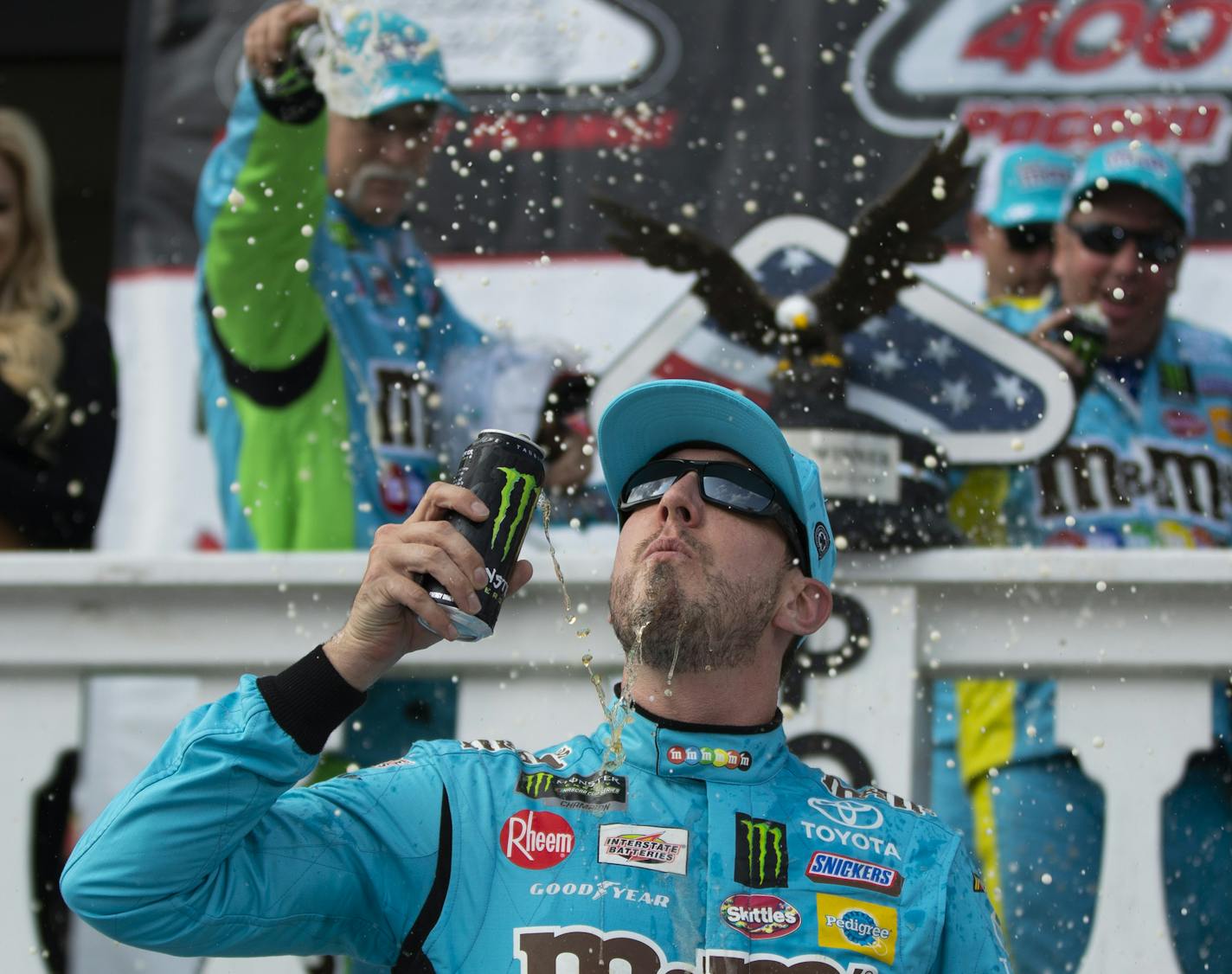 Kyle Busch celebrates in victory lane after winning a NASCAR Cup Series auto race at Pocono Raceway, Sunday, June 2, 2019, in Long Pond, Pa. (AP Photo/Matt Slocum)