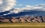 The drive into Great Sand Dunes National Park and Preserve shows a dramatic landscape.