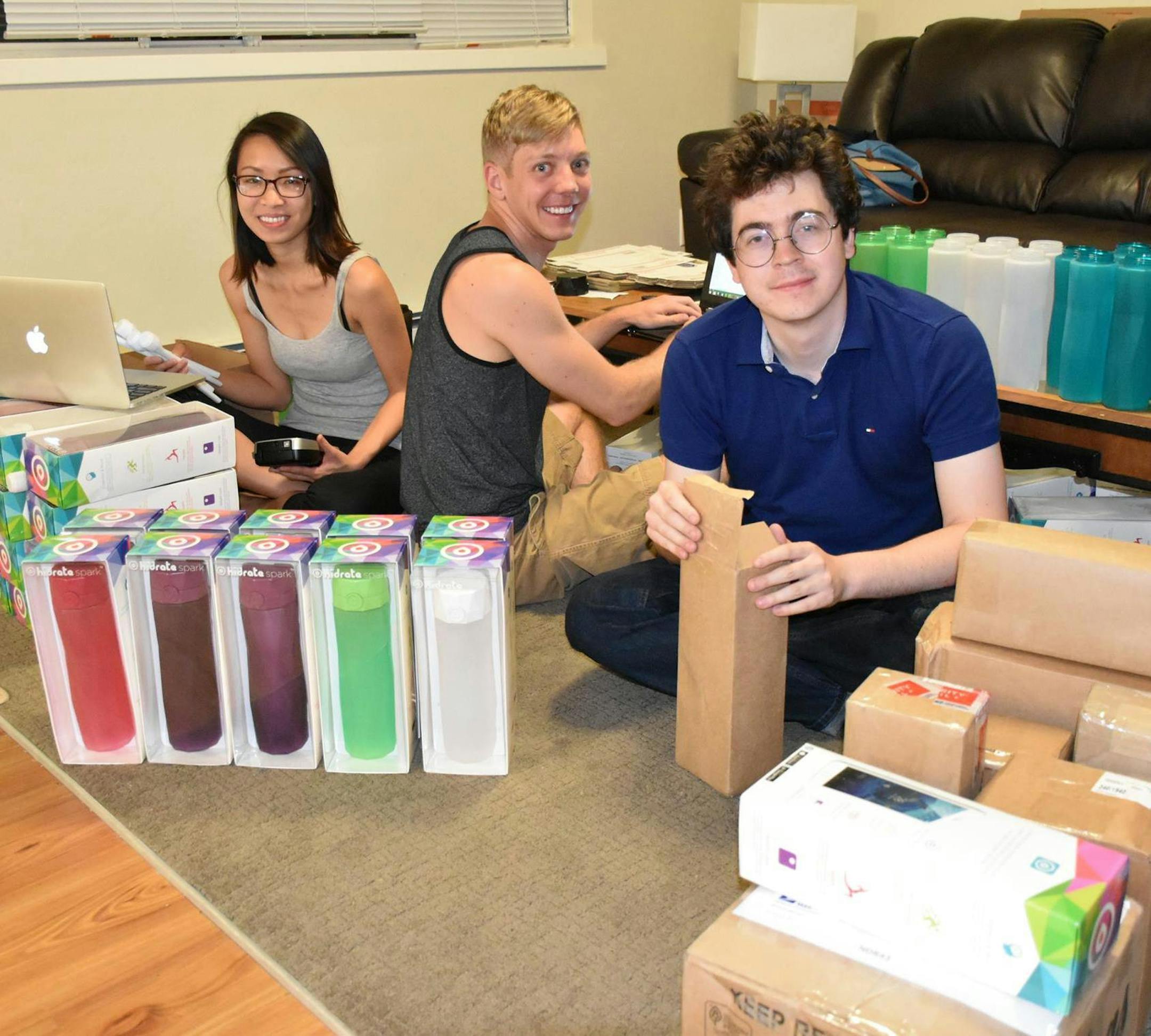 Three of the four HidrateMe founders filled orders from an apartment last year. With Nadya Nguyen are Cole Iverson (middle) and Alexander Hambrock (right). ORG XMIT: jJTQS4MbiyH9ChdTXgMk