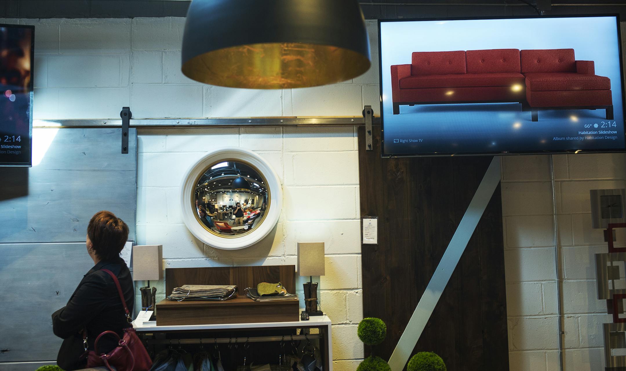 Greg Rich wants Habitation, his new furnture and design store, to dazzle his customers with technology. Instead of having clients flip through catalogs for furnishings, he has them checking out merchandise lifesize on LCD TVs. "We offer a level of technological integration that is unheard of in this business," Rich said.] Richard Tsong-Taatarii/rtsong-taatarii@startribune.com