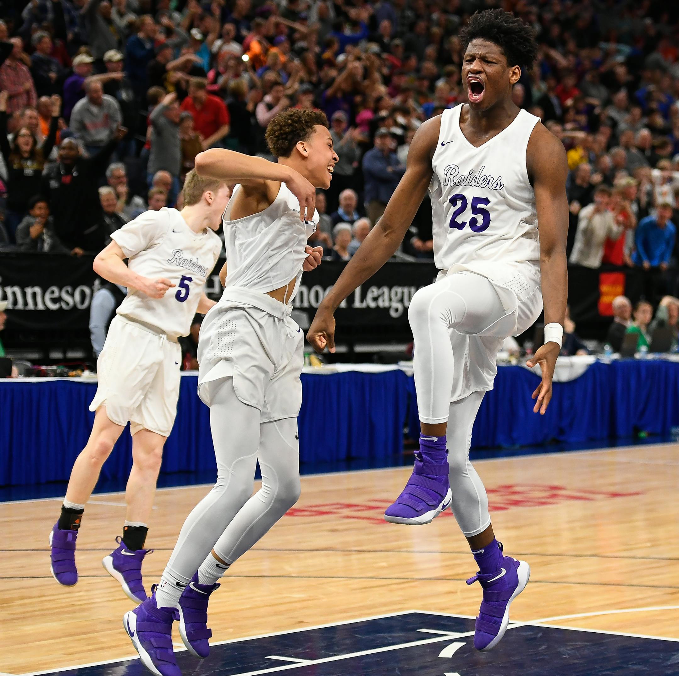 Cretin-Derham Hall forward Daniel Oturu (25) celebrated his dunk with .5 seconds left on the clock against Apple Valley, giving his team the win. ] AARON LAVINSKY ï aaron.lavinsky@startribune.com Apple Valley played Cretin-Derham Hall in a Class 4A boy's basketball championship game on Saturday, March 24, 2018 at Target Center in Minneapolis, Minn.