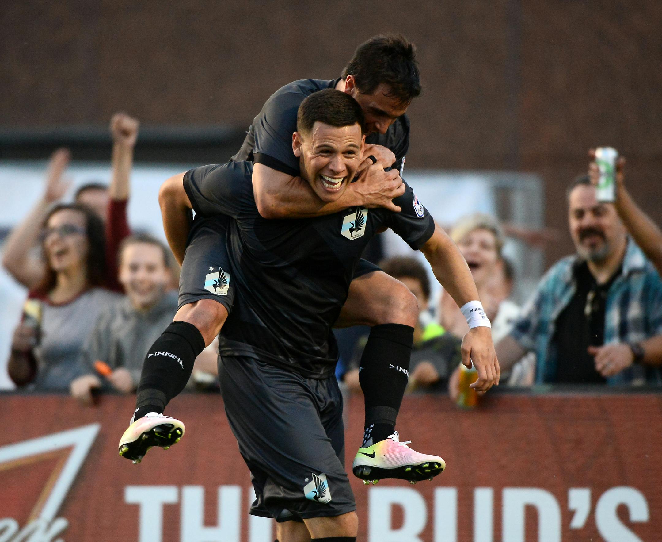 Minnesota United FC forward Danny Cruz (8) took a ride on the back of forward Christian Ramirez (21) after Ramirez scored a goal against the Fort Lauderdale Strikers in the first half Saturday. ] (AARON LAVINSKY/STAR TRIBUNE) aaron.lavinsky@startribune.com Minnesota United F.C. played the Ft. Lauderdale Strikers on Saturday, April 16, 2016 in Blaine, Minn.