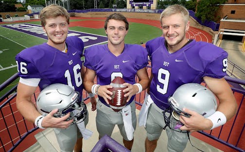 St. Thomas quarterbacks Jacques Perra, left, Gabe Green, center, and Alex Fenske, at the St. Thomas University Football Field, Thursday, August 25, 2016 in St. Paul, MN. ] (ELIZABETH FLORES/STAR TRIBUNE) ELIZABETH FLORES &#xef; eflores@startribune.com