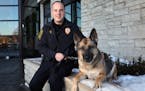 Officer Jason Behr sits for a portrait with his recently retired parter Blade, an 8-year-old German shepherd, Wednesday. ] ANTHONY SOUFFLE &#x2022; an