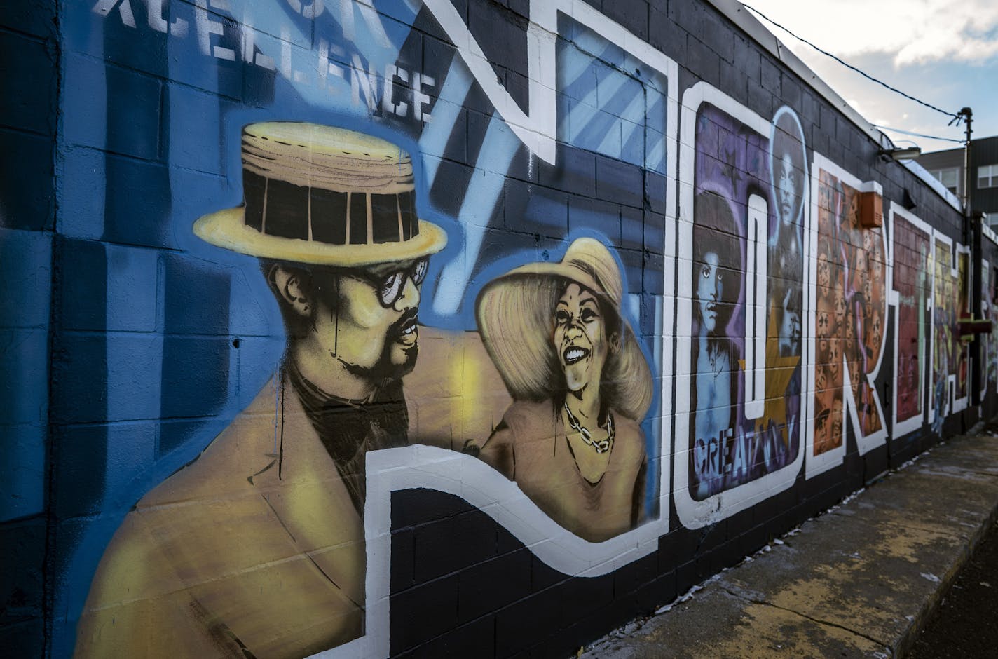 Wally's Food 1800 block of Penn Avenue N.] Jerry Holt •Jerry.Holt@startribune.com Profile of artist Peyton Scott Russell, who created the massive George Floyd piece at 38th and Chicago Monday October 26, 2020 in Minneapolis , MN.