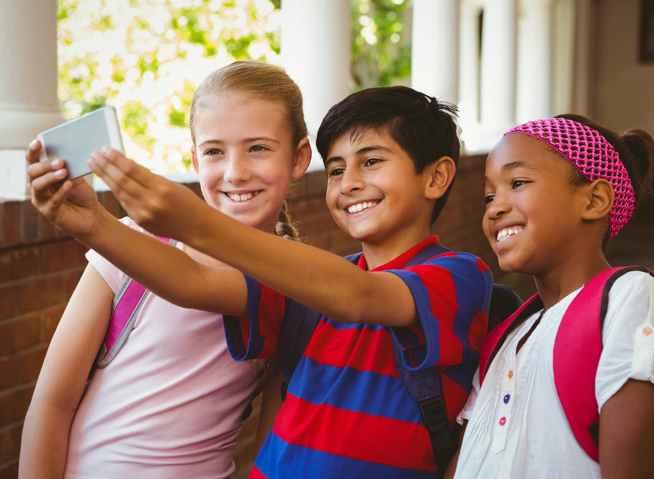 Students are receiving their first cellphones or smartphones at a younger age. The devices can be an educational tool or a classroom distraction. Experts say it's up to parents to establish rules for their kids, in and out of school. (Fotolia) ORG XMIT: 1172069